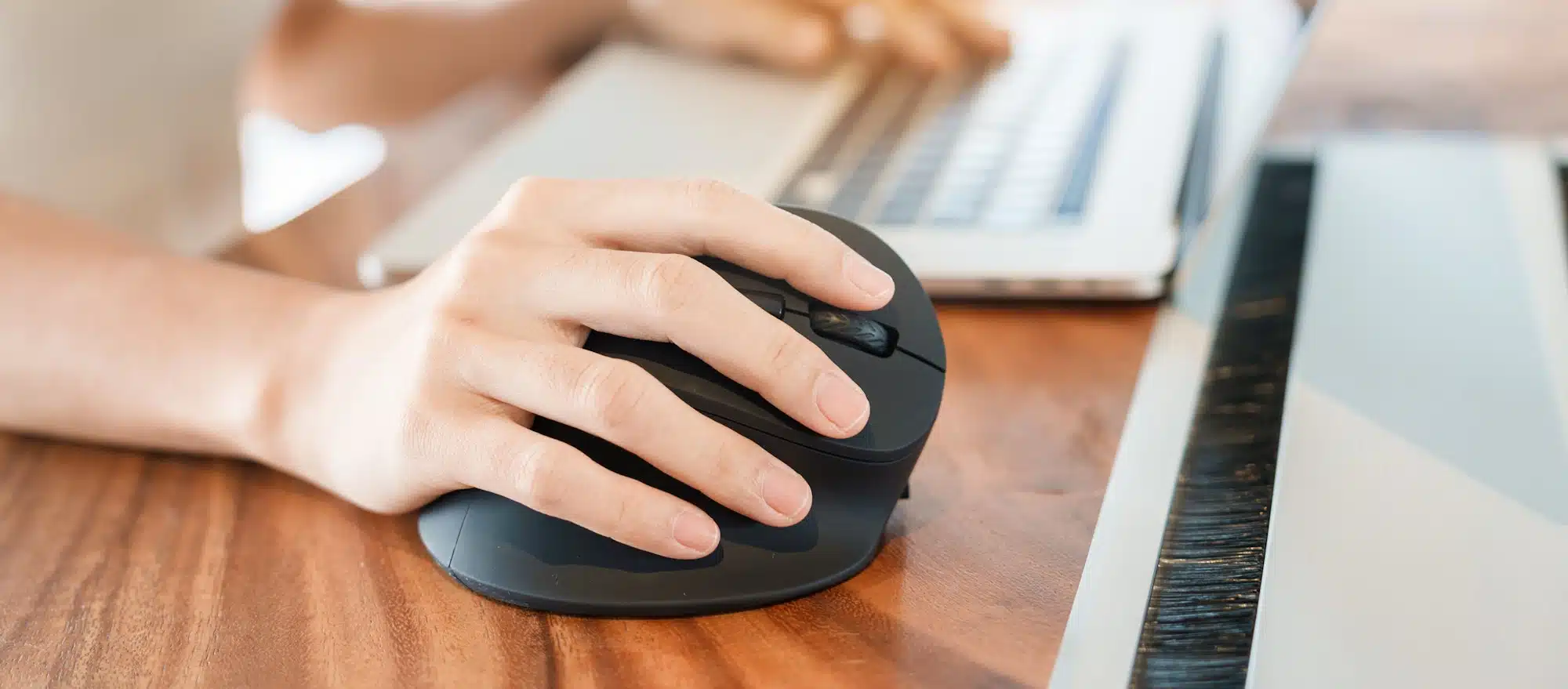 woman hand using computer ergonomic mouse