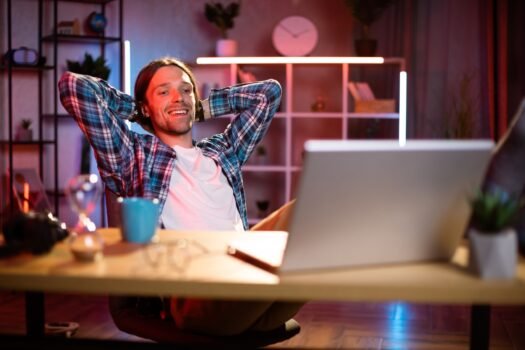 Dark atmosphere at home. Remote work during evening time.