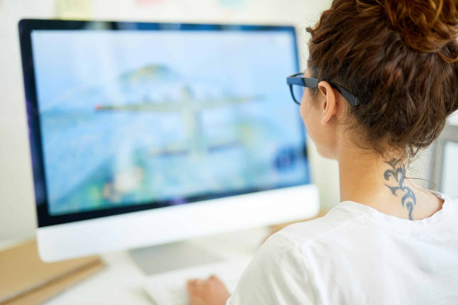 Designer in front of monitor